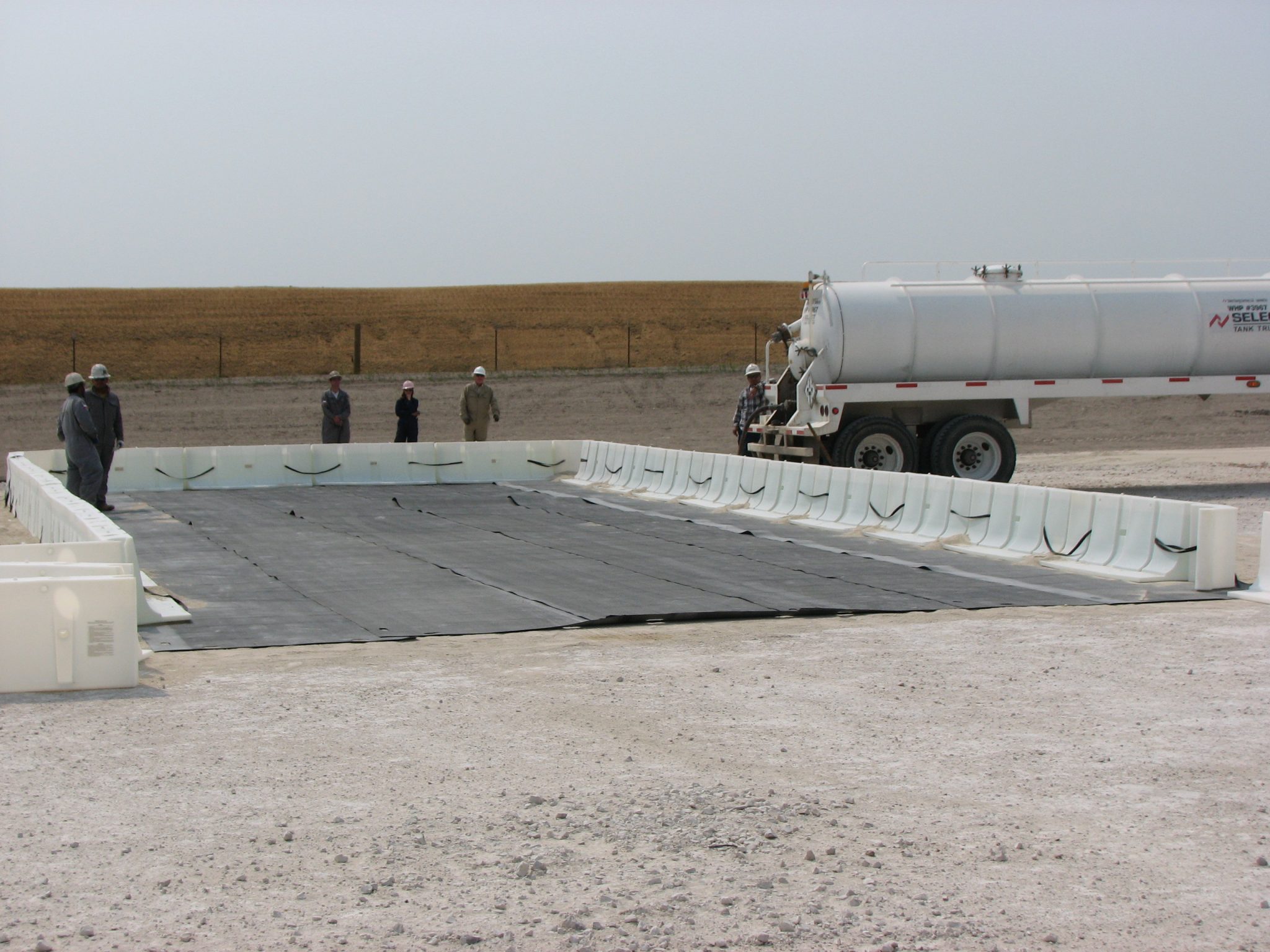 Secondary Containment Using Muscle Walls & Geomembrane Liner